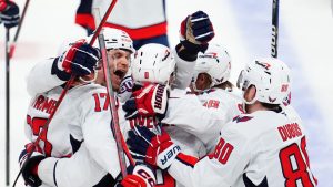 Washington Capitals' Alex Ovechkin (8) celebrates his game-winning goal against the Ottawa Senators with teammates during overtime NHL hockey action in Ottawa on Thursday, January 16, 2025. (Sean Kilpatrick/CP)