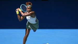 Coco Gauff of the U.S. plays a backhand return to Sofia Kenin of the U.S. during their first round match at the Australian Open tennis championship in Melbourne, Australia, Monday, Jan. 13, 2025. (Asanka Brendon Ratnayake/AP)
