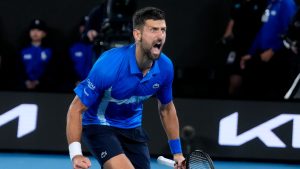 Novak Djokovic of Serbia celebrates after defeating Carlos Alcaraz of Spain in their quarterfinal match at the Australian Open tennis championship in Melbourne, Australia, early Wednesday, Jan. 22, 2025. (Asanka Brendon Ratnayake/AP Photo)