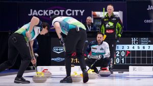 John Epping (second from right) watches his sweepers while playing against Brad Jacobs (far right) during the WFG Masters on Jan. 14, 2025, in Guelph, Ont. (Anil Mungal/GSOC)