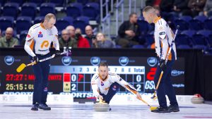 Brad Gushue (centre) throws a stone during the KIOTI National on Nov. 26, 2024, in St. John's, N.L. (Anil Mungal/GSOC)