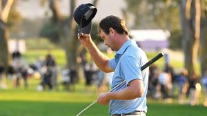 Harris English acknowledges the crowd after hitting a birdie putt on the 18th hole on the South Course at Torrey Pines during the third round of the Farmers Insurance Open golf tournament Friday, Jan. 24, 2025, in San Diego. (Denis Poroy/AP)