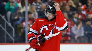 New Jersey Devils centre Jack Hughes (86) reacts during the first period of an NHL hockey game against the Philadelphia Flyers, Saturday, Jan. 18, 2025, in Newark, N.J. (Noah K. Murray/AP Photo)