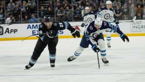 Utah Hockey Club defenceman Ian Cole (28) skates against Winnipeg Jets center David Gustafsson (19) during the second period of an NHL hockey game Monday, Jan. 20, 2025, in Salt Lake City. (Melissa Majchrzak/AP)