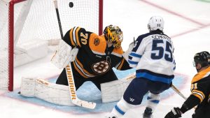 Winnipeg Jets centre Mark Scheifele shoots the puck past Boston Bruins goaltender Joonas Korpisalo for a goal during the third period of an NHL hockey game, Thursday, Jan. 30, 2025, in Boston. (Charles Krupa/AP)