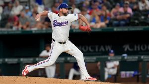 Texas Rangers relief pitcher Kirby Yates throws to the Minnesota Twins in a baseball game. (Tony Gutierrez/AP)