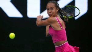 Leylah Fernandez of Canada plays a backhand return to Yuliia Starodubtseva of Ukraine during their first round match at the Australian Open tennis championship in Melbourne. (Asanka Brendon Ratnayake/AP)