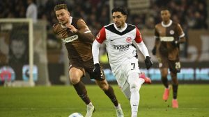 St. Pauli's Hauke Wahl, left and Frankfurt's Omar Marmoush vie for the ball, during the German Bundesliga soccer match between FC St. Pauli and Eintracht Frankfurt, in Hamburg, Germany. (Gregor Fischer/AP)