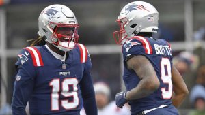 New England Patriots wide receiver Kayshon Boutte (9) is congratulated by Patriots quarterback Joe Milton III (19) after his touchdown agains the Buffalo Billsduring the first half of an NFL football game. (Steven Senne/AP)