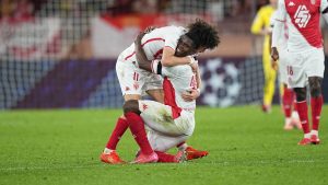 Monaco's Maghnes Akliouche, left, and Breel Embolo celebrate after a Champions League opening phase soccer match. (Laurent Cipriani/AP)