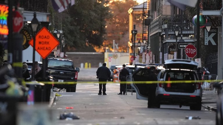 Emergency services attend the scene after a vehicle drove into a crowd on New Orleans' Canal and Bourbon Street, Wednesday Jan. 1, 2025. (Gerald Herbert/AP Photo)