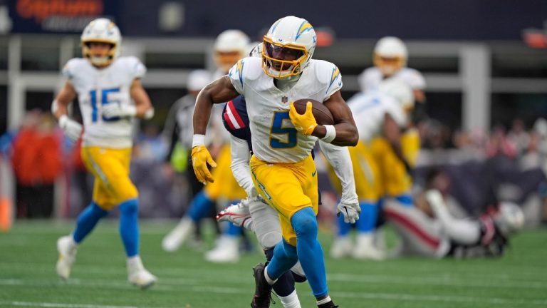 Los Angeles Chargers wide receiver Josh Palmer runs after a catch in an NFL football game against the New England Patriots, Saturday, Dec. 28, 2024, in Foxborough, Mass. (Robert F. Bukaty/AP Photo)