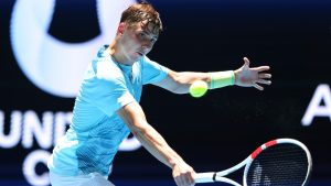 Alexander Shevchenko of Kazakhstan hits a return shot to Daniel Masur of Germany during their United Cup tennis match in Perth, Australia, Wednesday, Jan. 1, 2025. (Trevor Collens/AP)