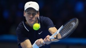 Italy's Jannik Sinner returns to Taylor Fritz of the United States during the final match of the ATP World Tour Finals at the Inalpi Arena, in Turin, Italy, Sunday, Nov. 17, 2024. (Antonio Calanni/AP)