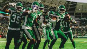 The Roughriders defenders led by Jameer Thurman celebrate a turnover. (Saskatchewan Roughriders/X).