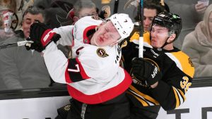 Ottawa Senators left wing Brady Tkachuk (7) collides with Boston Bruins centre Morgan Geekie (39) during the first period of an NHL hockey game, Thursday, Jan. 23, 2025, in Boston. (Charles Krupa/AP Photo)