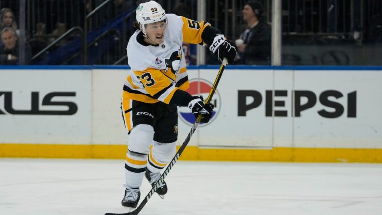 Pittsburgh Penguins' Philip Tomasino (53) shoots the puck during the first period of an NHL hockey game against the New York Rangers Friday, Dec. 6, 2024, in New York. (Frank Franklin II/AP)