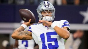 Dallas Cowboys quarterback Trey Lance warms up before an NFL football game. (Sam Hodde/AP)