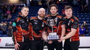 Ross Whyte, Robin Brydone, Duncan McFadzean and Euan Kyle celebrate with the WFG Masters trophy on Jan. 19, 2025, in Guelph, Ont. (Anil Mungal/GSOC)