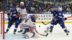 Edmonton Oilers goaltender Stuart Skinner (74) makes a save on a shot by Tampa Bay Lightning centre Jake Guentzel (59) during the second period of an NHL hockey game, Tuesday, Feb. 25, 2025, in Tampa, Fla. (Chris O'Meara/AP)