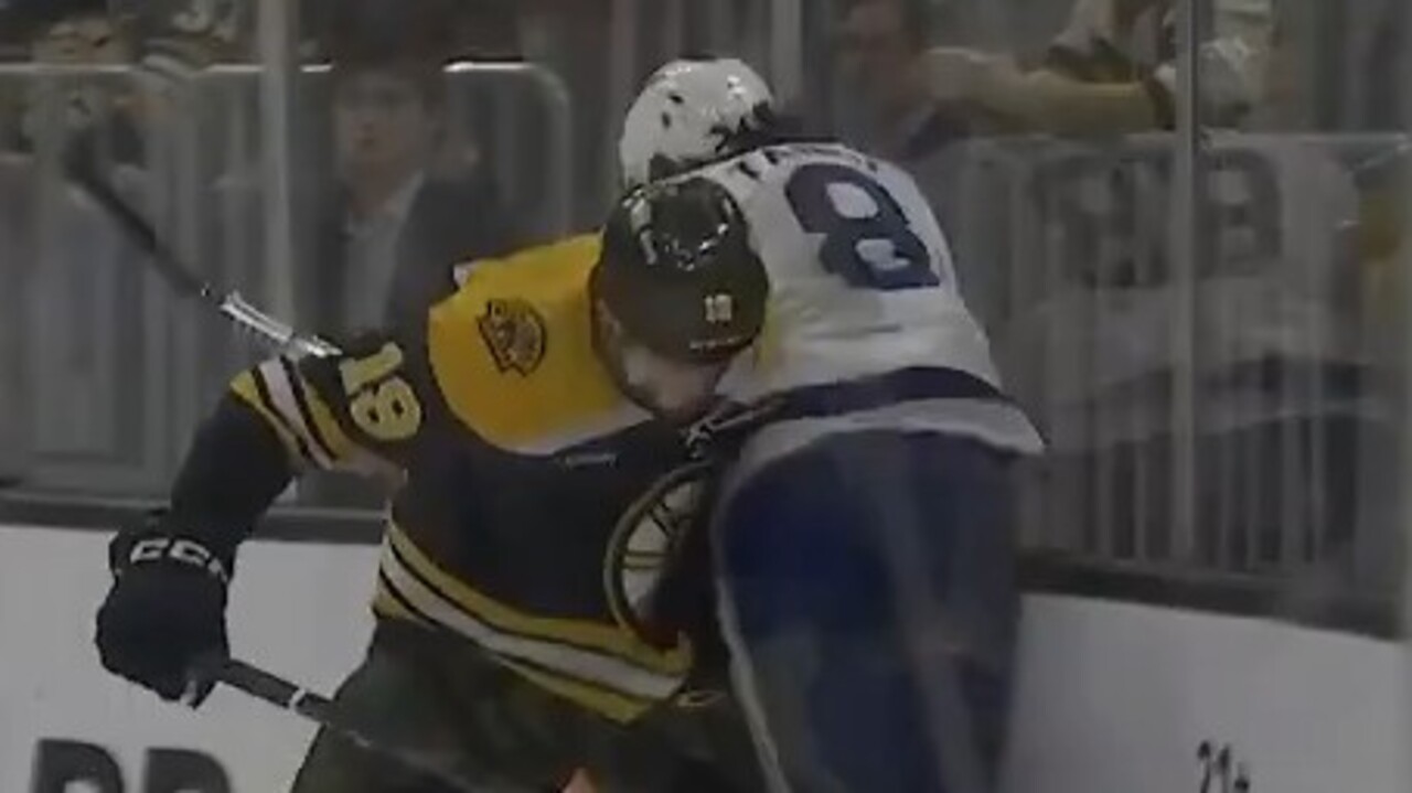 Tanev exits game with apparent injury after taking hit from Bruins’ Beecher