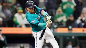 eattle Mariners' Justin Turner hits an RBI single during the 10th inning against the Oakland Athletics to win 7-6 in a baseball game, Saturday, Sept. 28, 2024, in Seattle. (John Froschauer/AP)