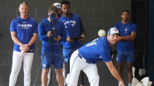 Toronto Blue Jays pitcher Max Scherzer, front, throws a pitching session during opening day of spring training in Dunedin, Fla., Thursday, Feb. 13, 2025. (Nathan Denette/CP)