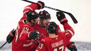 Canada's Sidney Crosby, centre, celebrates after his goal against Finland during the third period of a 4 Nations Face-Off hockey game, Monday, Feb. 17, 2025, in Boston. THE CANADIAN PRESS/AP-Charles Krupa