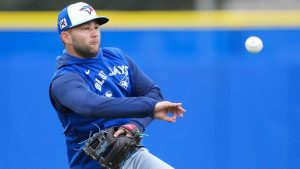 Toronto Blue Jays shortstop Bo Bichette throws the ball to first base in a drill during spring training in Dunedin Fla., on Thursday, Feb. 20, 2025. (CP/Nathan Denette)