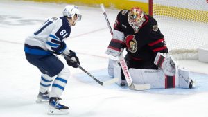 Ottawa Senators goaltender Linus Ullmark makes the save on Winnipeg Jets left wing Kyle Connor during third period NHL action, Wednesday, Feb 26, 2025 in Ottawa. (CP/Adrian Wyld)