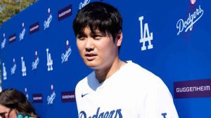 Los Angeles Dodgers' Shohei Ohtani talks to the media during a baseball interview during DodgerFest at Dodger Stadium, Saturday, Feb. 1, 2025, in Los Angeles. (Richard Vogel/AP)