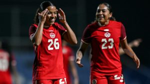 Canada's Marie Yasmine Alidou, left, celebrates after scoring during the international women's friendly soccer match between Canada and South Korea at the Pinatar Arena Football Center in Murcia, Spain, on Tuesday, Dec. 3, 2024. THE CANADIAN PRESS/AP/Francisco Macia Martinez