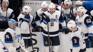 Finland's captain Aleksander Barkov talks with teammates while trailing Canada 0-4 during the third period of a 4 Nations Face-Off hockey game, Monday, Feb. 17, 2025, in Boston. (Charles Krupa/AP)