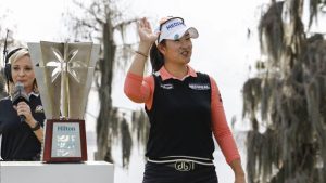 A Lim Kim, right, reacts to the crowd after being announced as the winner of the Hilton Grand Vacations Tournament of Champions LPGA golf tournament in Orlando, Fla., Sunday, Feb. 2, 2025. (Kevin Kolczynski/AP)
