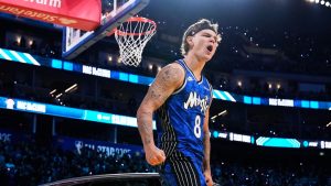 Orlando Magic guard Mac McClung celebrates after dunking over a car during the slam dunk contest at the NBA basketball All-Star Saturday night festivities Saturday, Feb. 15, 2025, in San Francisco. (Godofredo A. Vásquez/AP)