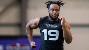 Alberta running back Ope Oshinubi takes part in 40-yard dash during the CFL's invitational combine in Waterloo, Ont. on Friday Feb. 28, 2025. THE CANADIAN PRESS/Dan Ralph