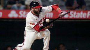 Los Angeles Angels' Michael Stefanic bunts during the eighth inning of a baseball game against the Colorado Rockies in Anaheim, Calif., Wednesday, July 31, 2024. (Eric Thayer/AP)