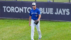 Toronto Blue Jays pitcher Max Scherzer walks to his first pitching session during opening day of spring training in Dunedin, Fla., Thursday, Feb. 13, 2025. (Nathan Denette/CP)