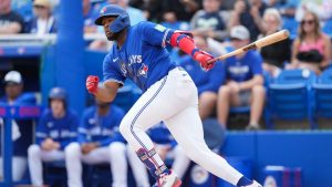 Toronto Blue Jays first baseman Vladimir Guerrero Jr. (27) hits a infield ground out against the New York Yankees during third inning Grapefruit League MLB baseball action in Dunedin Fla., on Saturday, February 22, 2025. (Nathan Denette/CP)