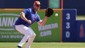 New York Mets infielder Pete Alonso handles a grounder during a spring training baseball practice. (Jeff Roberson/AP)