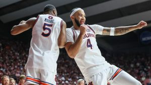 Auburn's Chris Moore (5) and Auburn's Johni Broome (4) rev up for the game before tip of the first half of an NCAA college basketball game against Alabama, Saturday, Feb. 15, 2025, in Tuscaloosa, Ala. (Vasha Hunt/AP Photo)