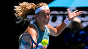 Victoria Azarenka of Belarus plays a forehand return to Lucia Bronzetti of Italy during their first round match at the Australian Open tennis championship in Melbourne, Australia, Monday, Jan. 13, 2025. (Vincent Thian/AP)