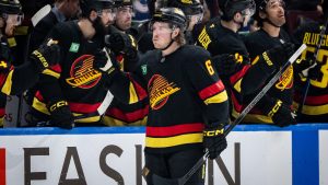 Vancouver Canucks' Brock Boeser (6) celebrates his goal against the Seattle Kraken with teammates during second period NHL hockey action in Vancouver on Saturday, December 28, 2024. (Ethan Cairns/CP)