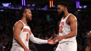 New York Knicks' Jalen Brunson, left, and Karl-Anthony Towns, right, react after Brunson scored during the second half of an NBA basketball game against the Houston Rockets, Monday, Feb. 3, 2025, in New York. (Pamela Smith/AP)