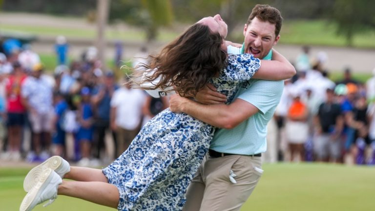 Brian Campbell, of the United States, embraces his girlfriend Kelsi McKee after winning the Mexico Open golf tournament in Puerto Vallarta, Mexico, Sunday, Feb. 23, 2025. (Fernando Llano/AP Photo)