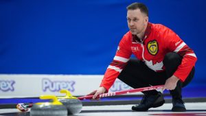 Team Canada skip Brad Gushue watches a shot approach the house while playing Team Alberta-Bottcher during the playoffs at the Brier, in Regina, on Saturday, March 9, 2024. (Darryl Dyck/CP)