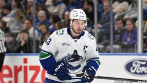 Vancouver Canucks' Quinn Hughes (43) in action against the St. Louis Blues during the second period of an NHL hockey game Monday, Jan. 27, 2025, in St. Louis. (Joe Puetz/AP)