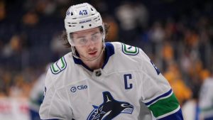 Vancouver Canucks defenceman Quinn Hughes (43) warms up for the team's NHL hockey game against the Nashville Predators, Wednesday, Jan. 29, 2025, in Nashville, Tenn. (George Walker IV/AP)