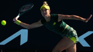 McCartney Kessler of the U.S. plays a forehand return to Zhang Shuai of China during their first round match at the Australian Open tennis championship in Melbourne, Australia, Tuesday, Jan. 14, 2025. (Manish Swarup/AP)