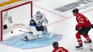 Canada's Nathan MacKinnon scores on Finland's Kevin Lankinen during the first period of a 4 Nations Face-Off hockey game, Monday, Feb. 17, 2025, in Boston. (Charles Krupa/AP)